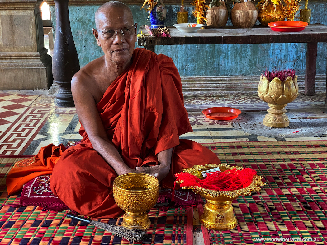 Blessings from the monk at Wat Kampong Tralach Leu.