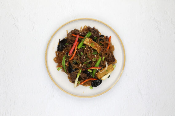 Japchae, made with sweet potato noodles, one of the delicious dishes on the menu at Arisun.