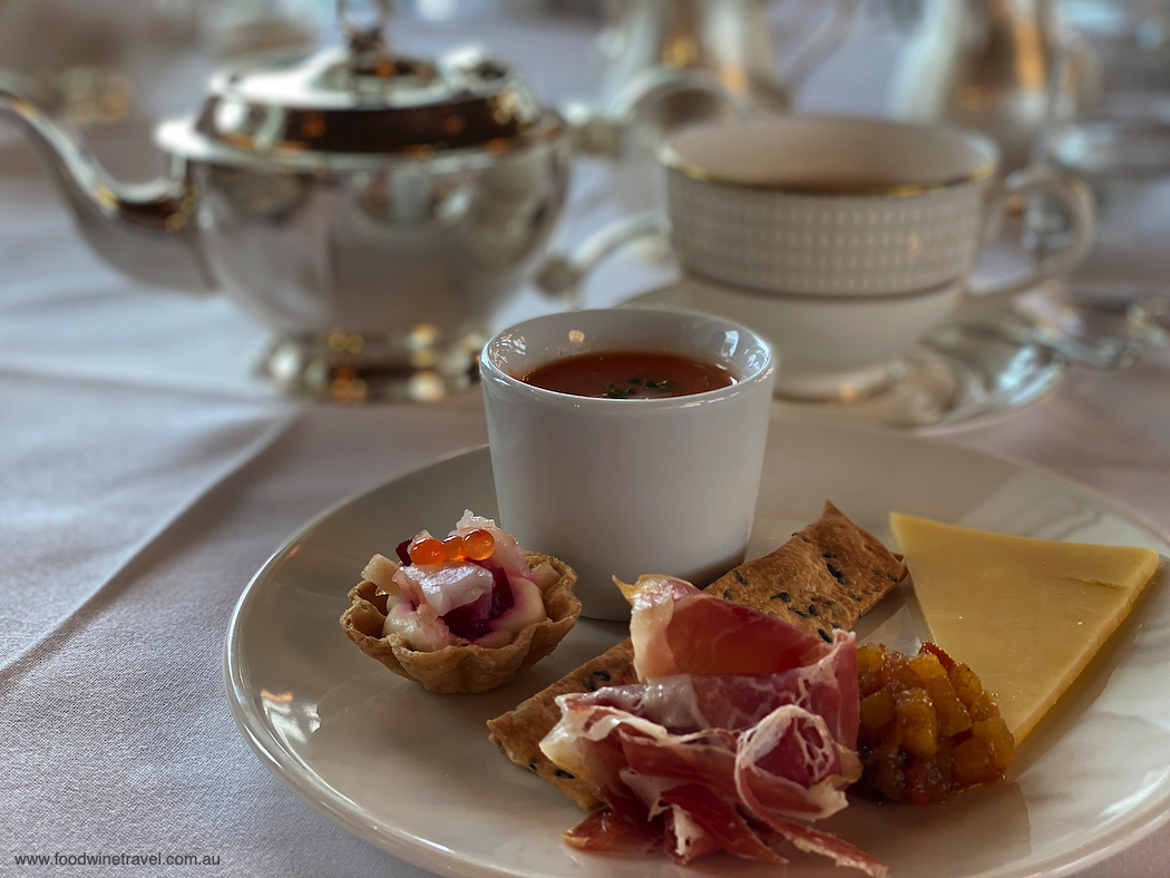 An indulgent High Tea at The Marion, with views over the lake.